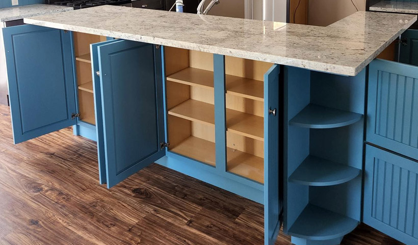 slate blue kitchen cabinet refinishing with granite countertop