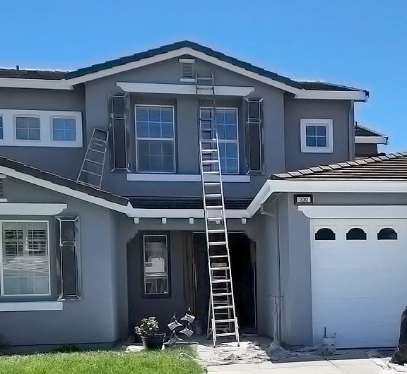 your dedicated exterior home painter in Oakley is working on this house